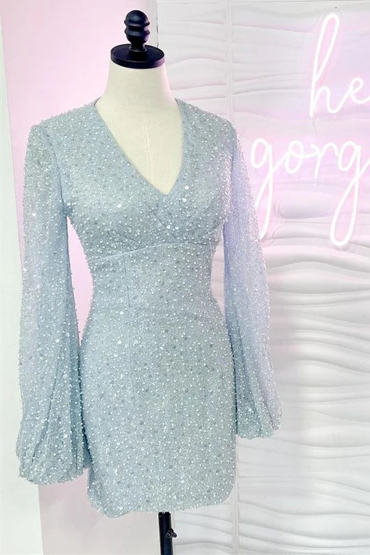 Vestido de cóctel con lentejuelas, cuello cruzado y mangas globo